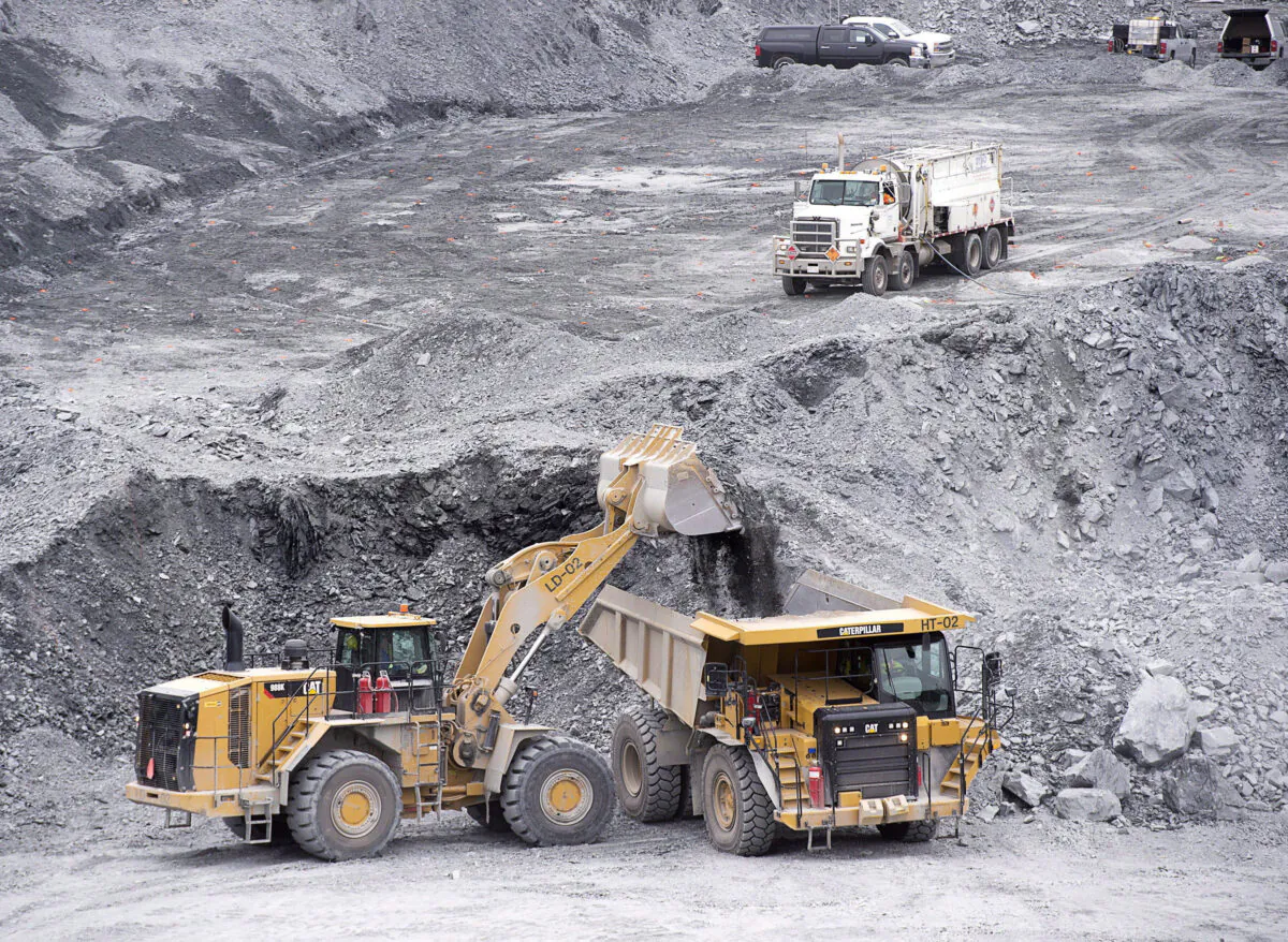 Excavators work at Atlantic Gold Corporation's Touquoy open pit gold mine in Nova Scotia in a file photo. (Andrew Vaughan/The Canadian Press)