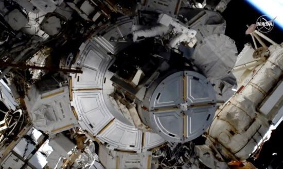 Astronaut Completes Spacewalk Without Helmet Camera, Lights