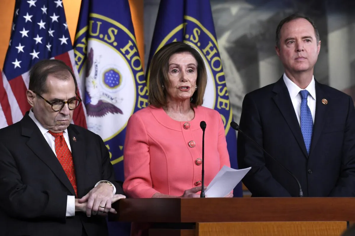 House Speaker Nancy Pelosi (D-Calif.) (C), flanked by House Judiciary Committee Chairman Rep. Jerrold Nadler (D-N.Y.) (L) and House Intelligence Committee Chairman Rep. Adam Schiff (D-Calif.)(R), speaks during a news conference to announce impeachment managers on Capitol Hill in Washington, on Jan. 15, 2020. (Susan Walsh/AP Photo)