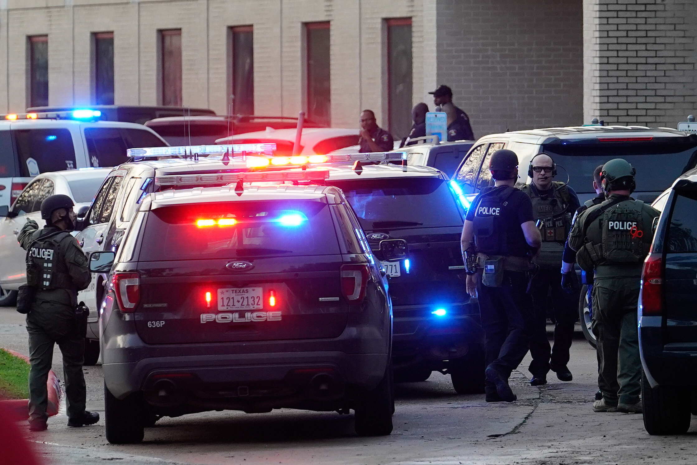 Police officers respond to a shooting at Bellaire High School