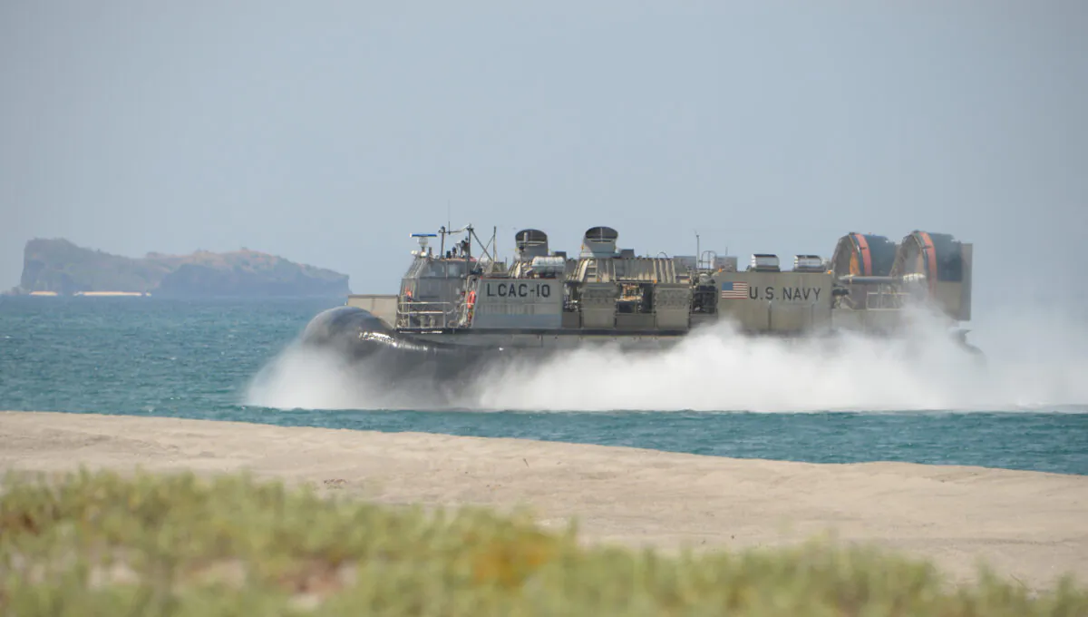 A U.S. Navy hover craft prepares to hit the beach during the amphibious landing exercises as part of the annual joint U.S.-Philippines military exercise on the shores of San Antonio town, facing the South China Sea, Zambales Province, on April 11, 2019. (Ted Aljibe/AFP via Getty Images