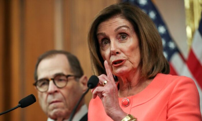 U.S. House Speaker Nancy Pelosi (D-CA) speaks next to House manager Judiciary Committee Chairman Jerrold Nadler (D-NY) in Washington on Jan. 15, 2020. (Leah Millis/Reuters)