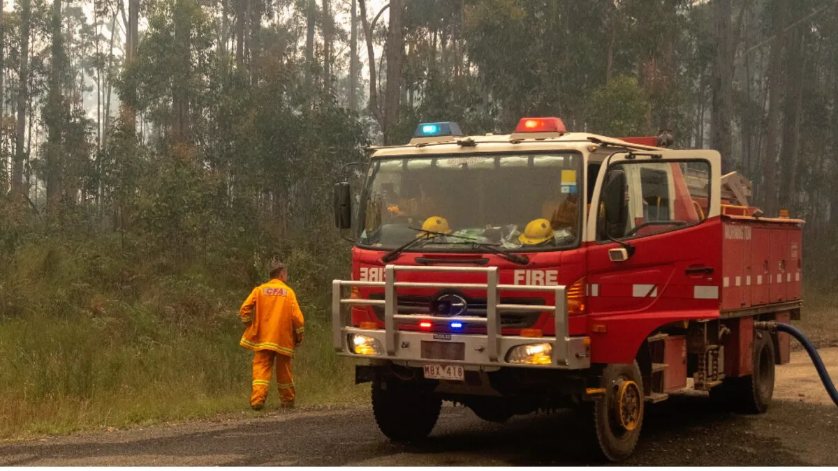 Fire trucks refills with water along the Princes Highway near Mallacoota, Australia, on Jan. 15, 2020. (Luis Ascui/Getty Images)