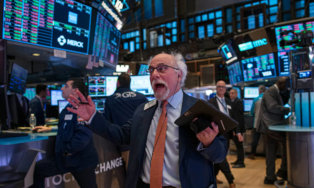 A trader reacts as he works on the floor of the New York Stock Exchange (NYSE) in New York City on Jan. 10, 2020. (Kena Betancur/Getty Images)