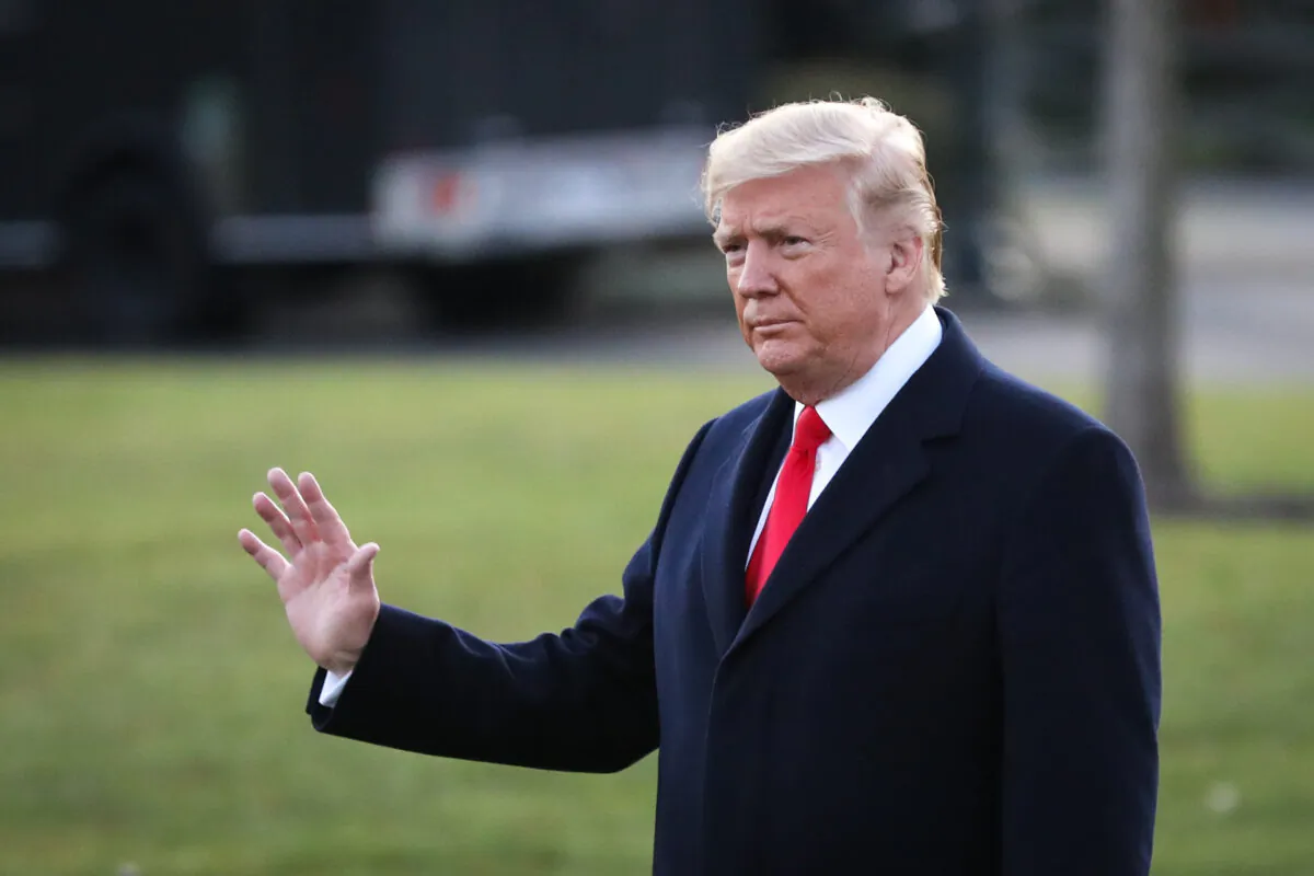 President Donald Trump walks on the South Lawn to board Marine One at the White House in Washington on Dec. 18, 2019. (Charlotte Cuthbertson/The Epoch Times)