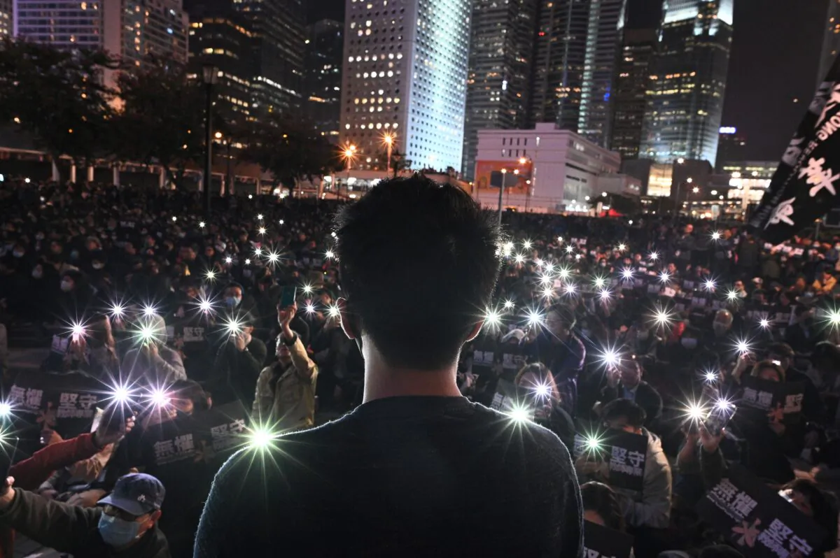 Protesters take part in a rally to support teachers at Edinburgh Place in the Central district of Hong Kong, on Jan. 3, 2020. (Philip Fong/AFP via Getty Images)