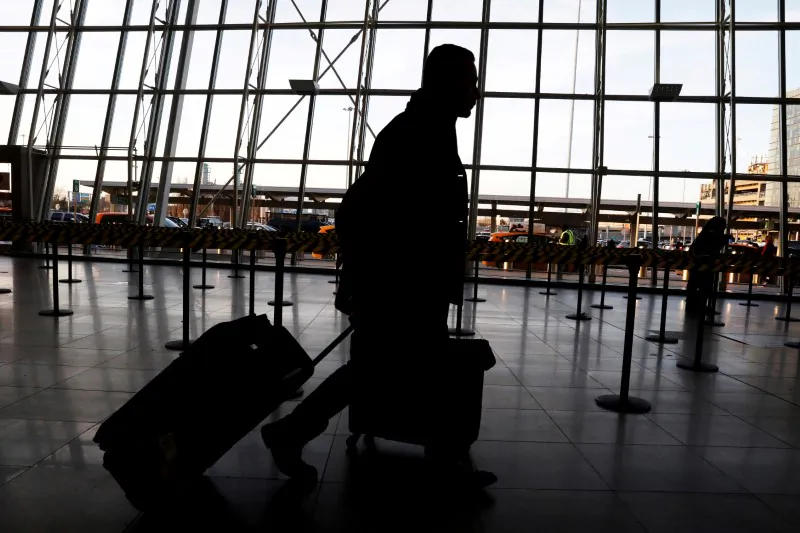 International travelers arrive at John F. Kennedy international airport in New York City, N.Y., on Feb. 4, 2017. (Brendan McDermid/Reuters)