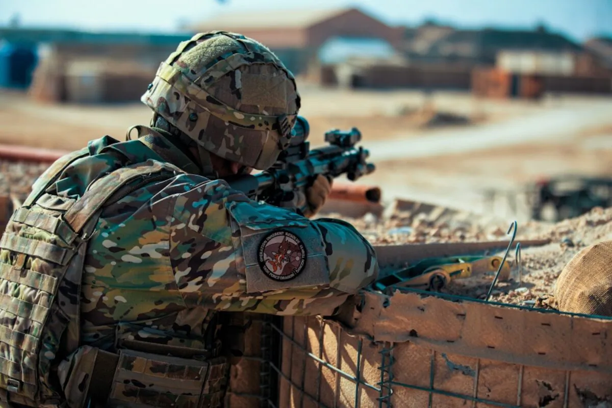 A soldier scans his sector of fire during a base defense exercise at Al Asad Air Base, Iraq, on Jan. 2, 2020.  (U.S. Army photo by Spc. Derek Mustard/Public Domain/File)