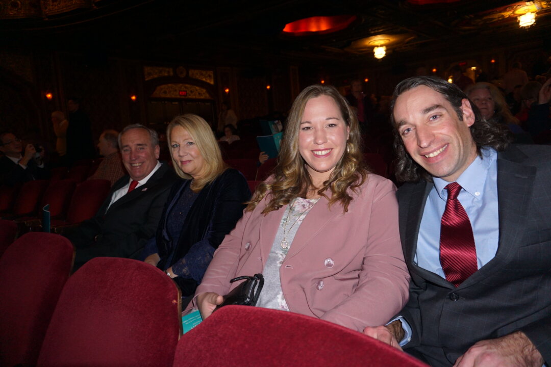 Adam (R), his girlfriend Allison, and his parents Donald and Linda Peterson at Providence Performing Arts Center in Providence, Rhode Island on Jan. 18, 2020. (Sally Sun/The Epoch Times)