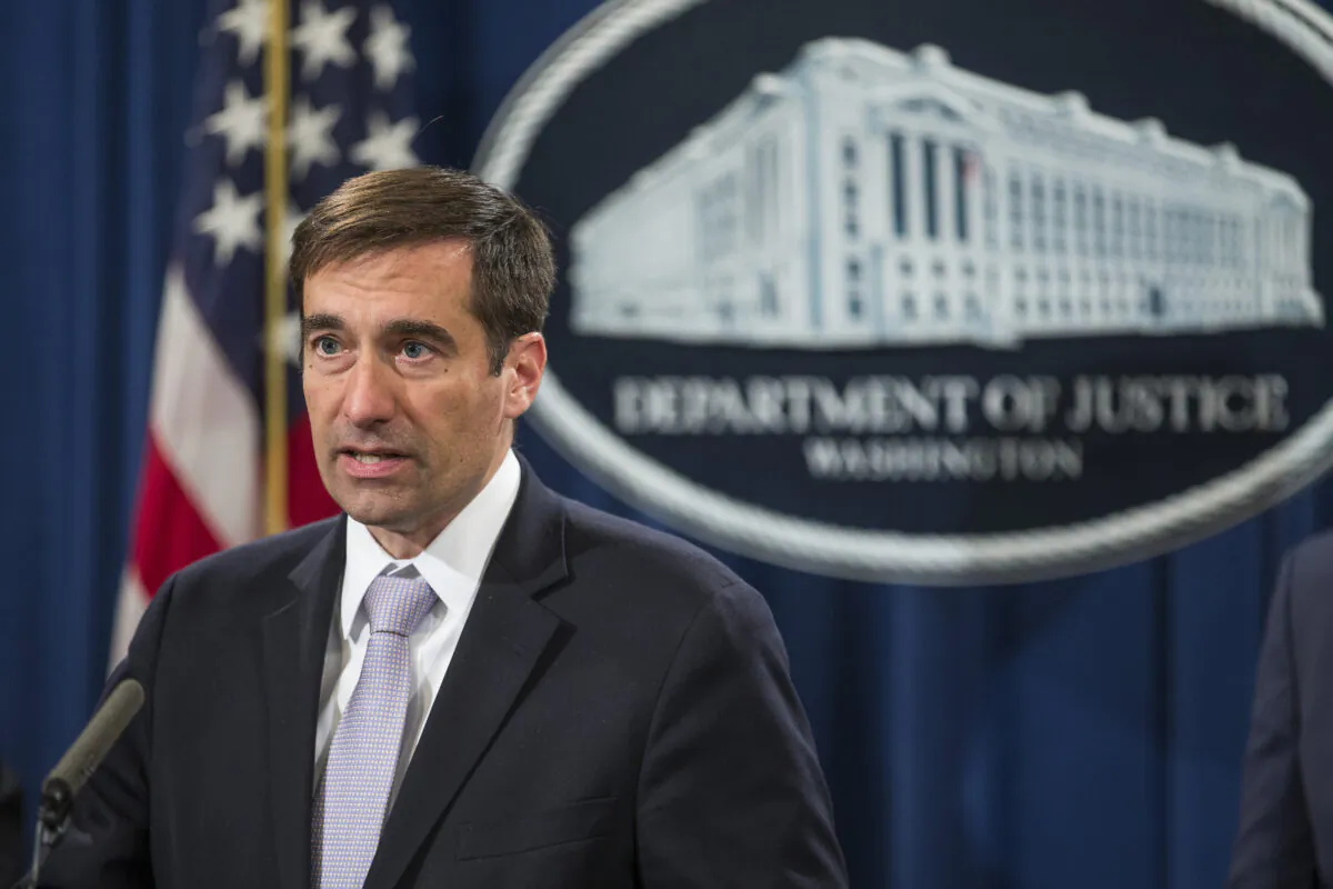 Assistant Attorney General for the National Security Division John Demers speaks during a news conference discussing new criminal law enforcement action against China for economic espionage on Nov. 1, 2018 in Washington. (Zach Gibson/Getty Images)