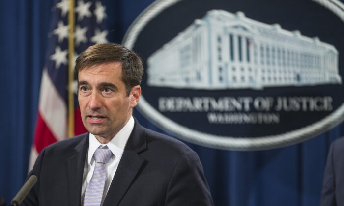 Assistant Attorney General for the National Security Division John Demers speaks during a news conference discussing new criminal law enforcement action against China for economic espionage on Nov. 1, 2018 in Washington. (Zach Gibson/Getty Images)