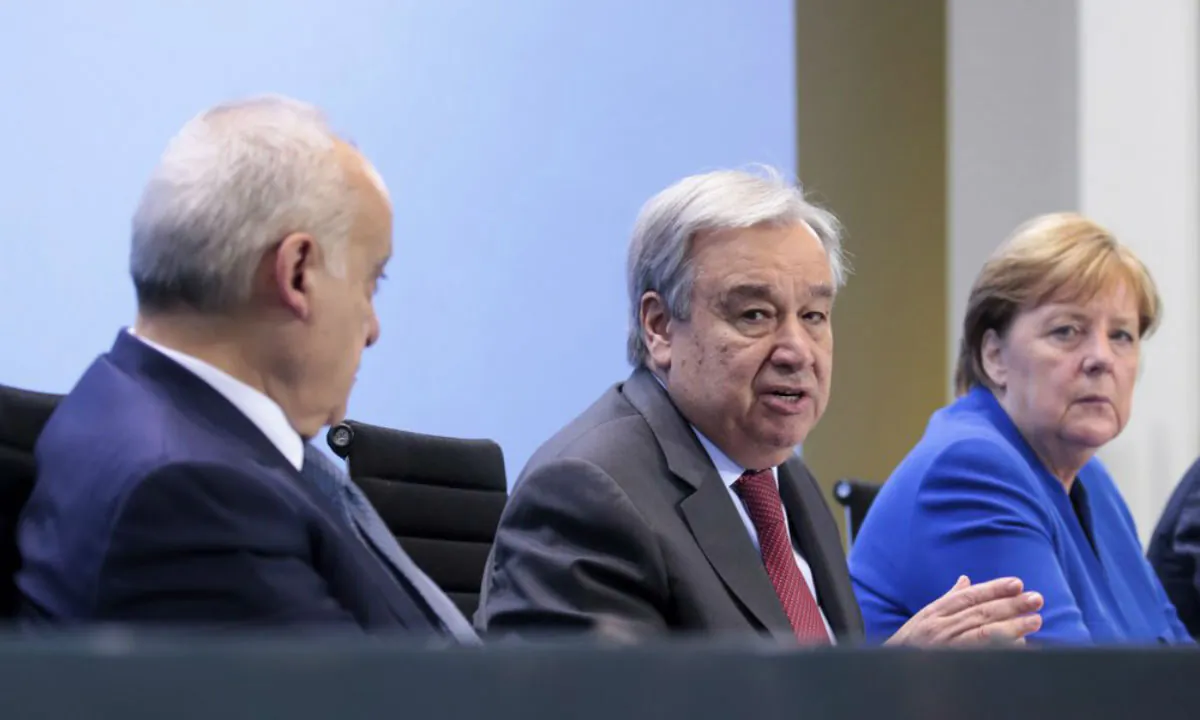 From left, U.N. Envoy for Libya, Ghassan Salame, United Nations Secretary-General Antonio Guterres, and German Chancellor Angela Merkel attend a news conference after the conference on Libya at the chancellery in Berlin, Germany, on Jan. 19, 2020. (Axel Schmidt/Pool Photo via AP)