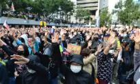 Hong Kong Police Fire Tear Gas to Disperse Thousands Calling for International Sanctions on Chinese Officials