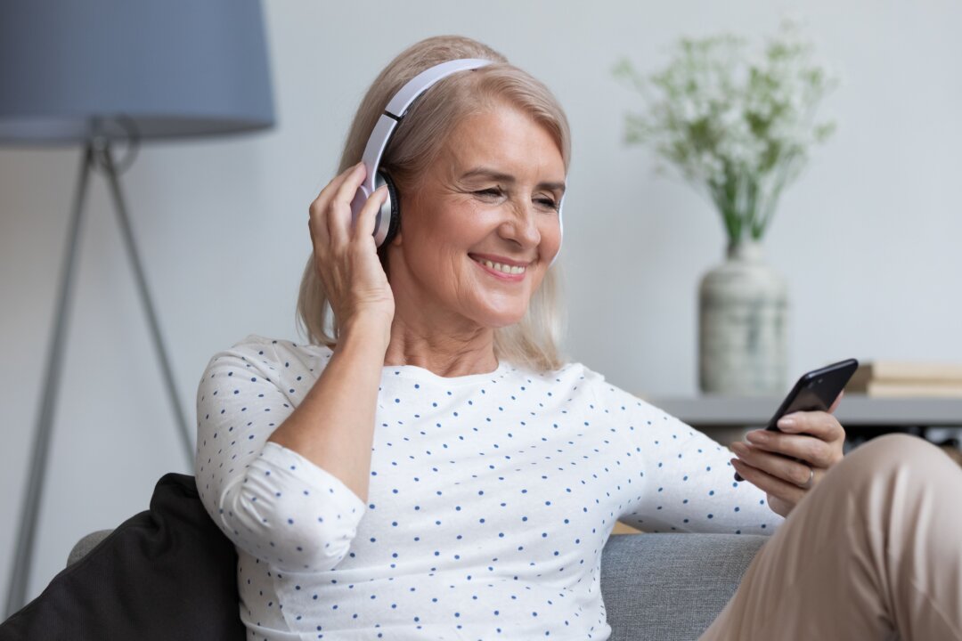 If you are looking to change your mood, music can give you a specific emotional experience. (fizkes/Shutterstock)