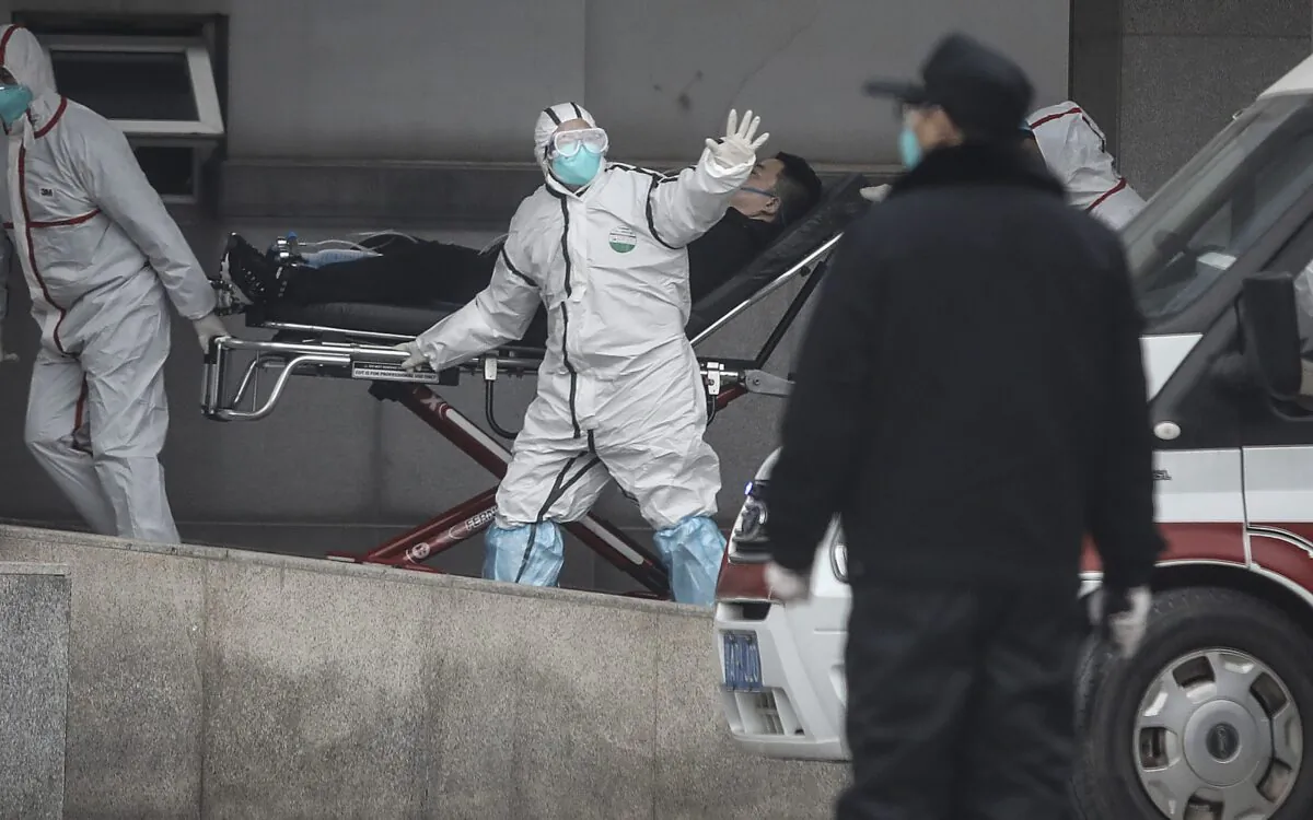 Medical staff transfer patients to Jinyintan hospital in Wuhan, China on Jan. 17, 2020. (Getty Images)