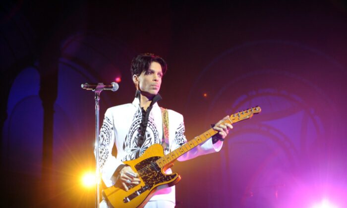 Singer Prince performs at the Grand Palais in Paris on Oct. 11, 2009. (Bertrand Guay/AFP via Getty Images)