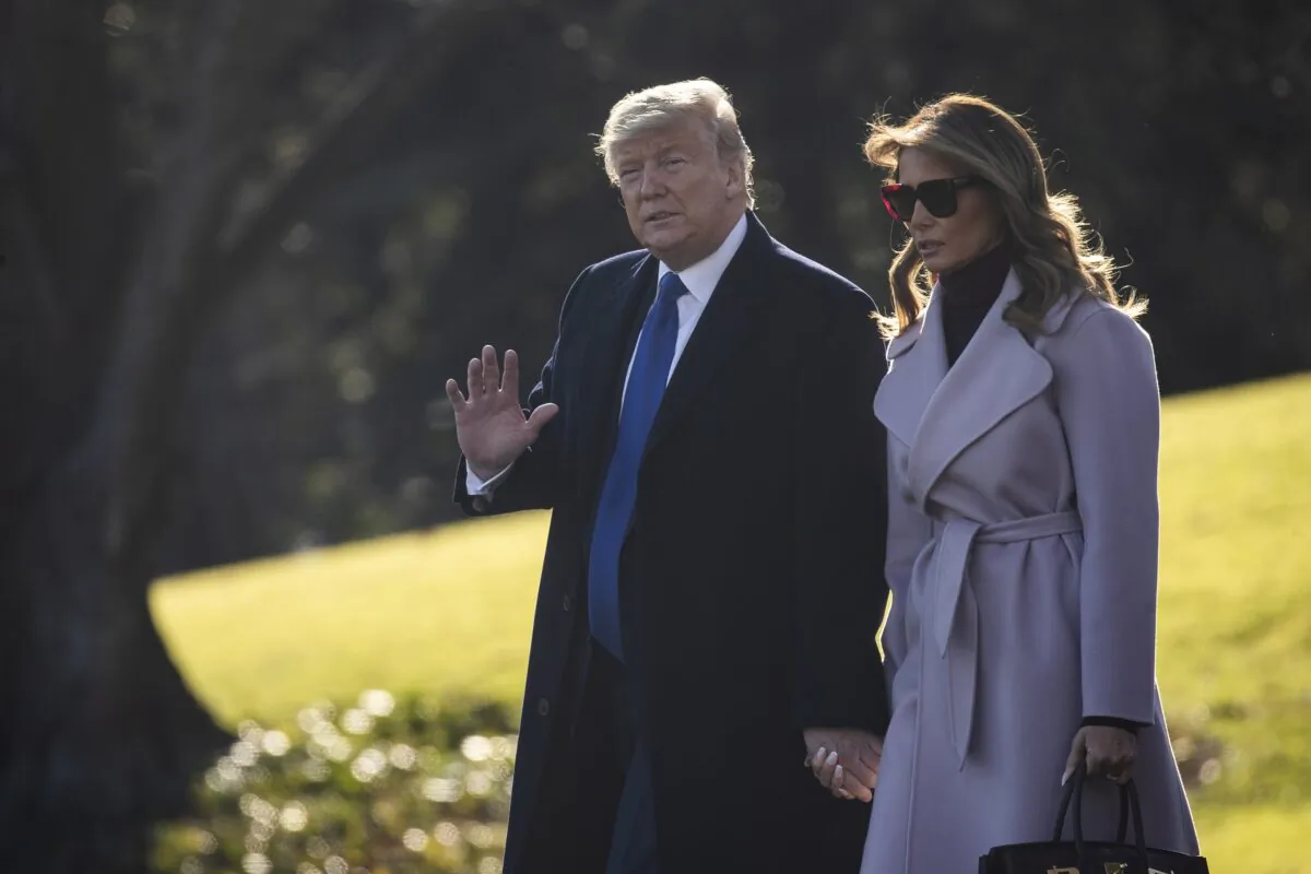 President Donald Trump and first lady Melania Trump walk across the South Lawn toward Marine One at the White House on Jan. 17, 2020. The Trump family is headed to Mar-a-Lago for the weekend. (Drew Angerer/Getty Images)