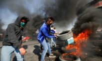 Four Protesters, Two Policemen Killed as Iraq Unrest Resumes