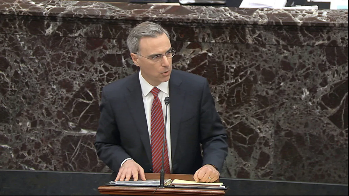 White House counsel Pat Cipollone speaks in favor of of Senate Resolution 483, the organizing resolution for the impeachment trial against President Donald Trump in the Senate at the U.S. Capitol in Washington, Tuesday, Jan. 21, 2020. (Senate Television via AP)