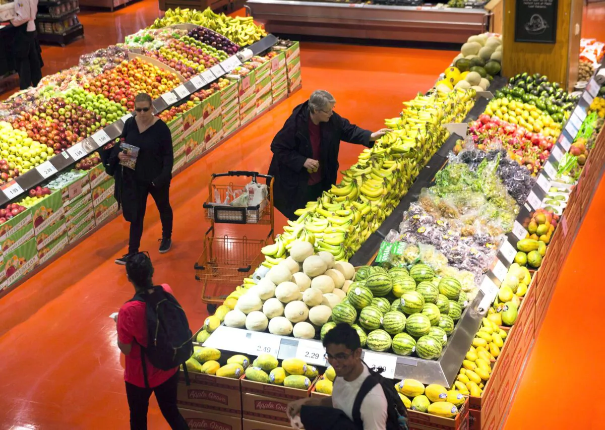 People shop at a Loblaws store in Toronto on May 3, 2018. (The Canadian Press/Nathan Denette)
