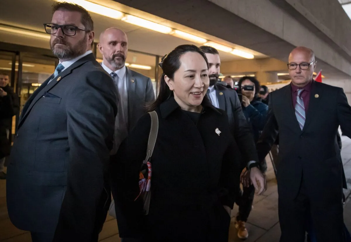 Huawei executive Meng Wanzhou, who is out on bail and remains under partial house arrest, leaves the B.C. Supreme Court in Vancouver on Jan. 21, 2020. (The Canadian Press/Darryl Dyck)