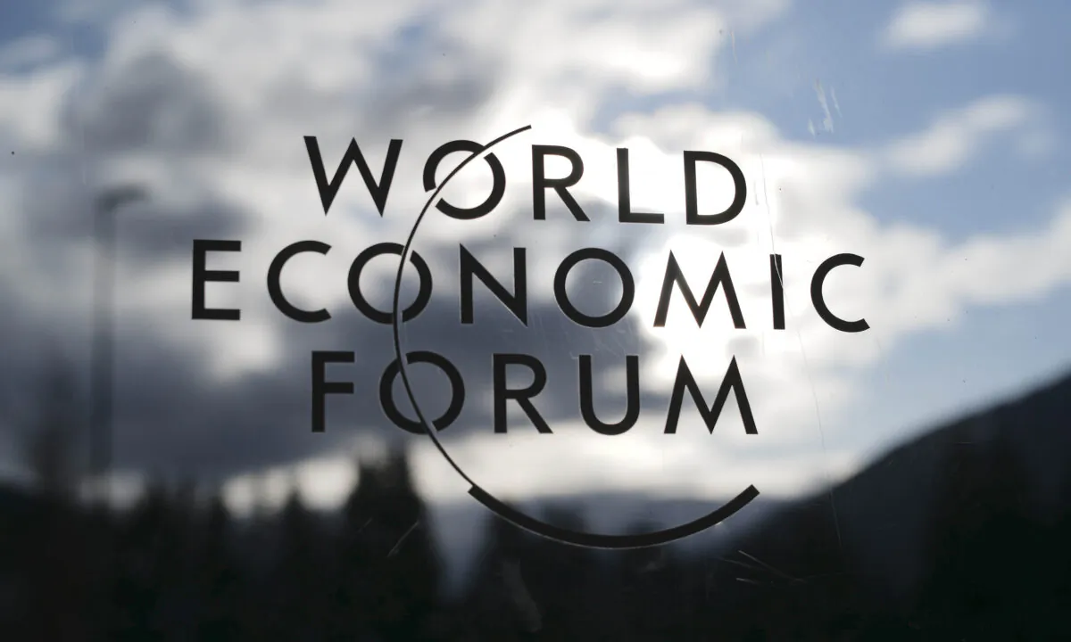 The logo of the World Economy Forum is displayed on a door at the Congress Centre in Davos, Switzerland, on Jan. 19, 2020. Markus Schreiber/AP Photo