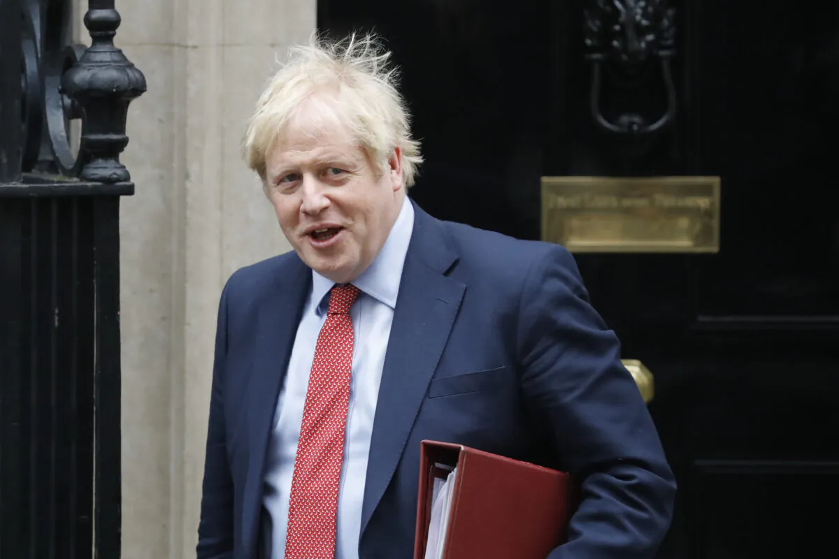 Britain's Prime Minister Boris Johnson leaves number 10 Downing Street in central London on Jan.22, 2020. (Tolga Akmen/AFP via Getty Images)