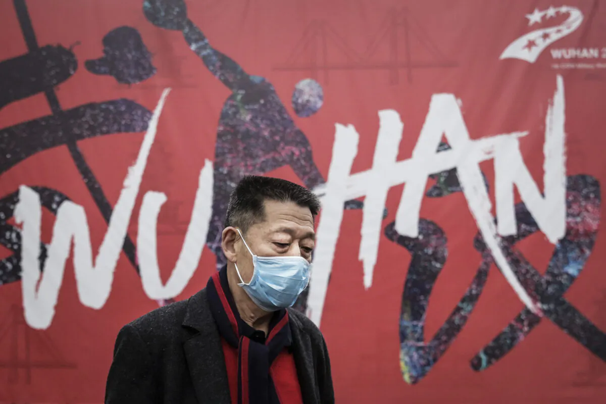 A man wears a mask while walking in the street in Wuhan, China on Jan. 22, 2020. (Getty Images)