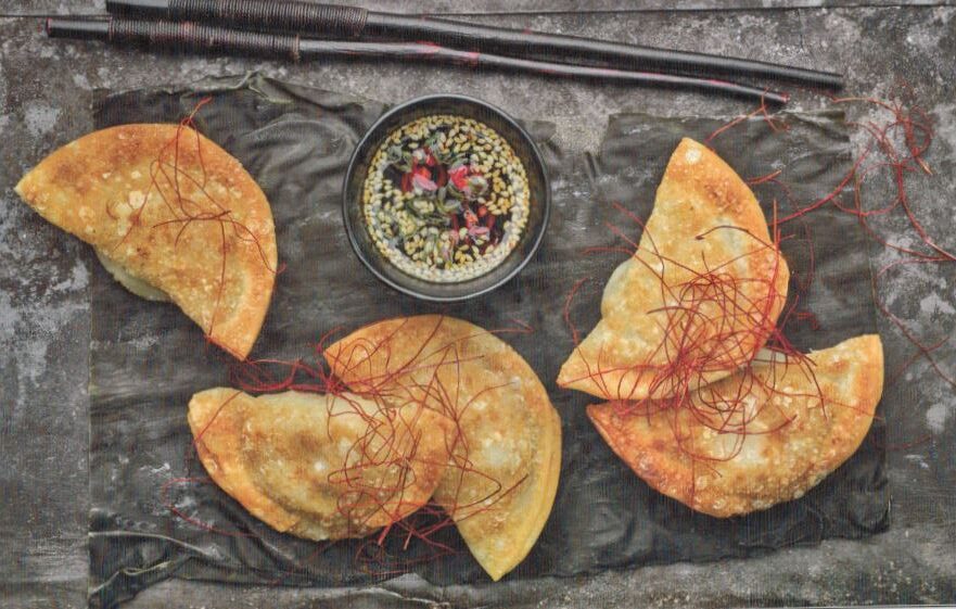 Fried mandu with chile-soy dipping sauce. (Jean Cazals)