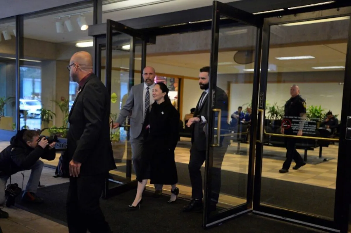 Huawei Chief Financial Officer Meng Wanzhou leaves B.C. Supreme Court for the day during her extradition hearing in Vancouver, British Columbia, Canada on Jan. 21, 2020. (Jennifer Gauthier/Reuters)