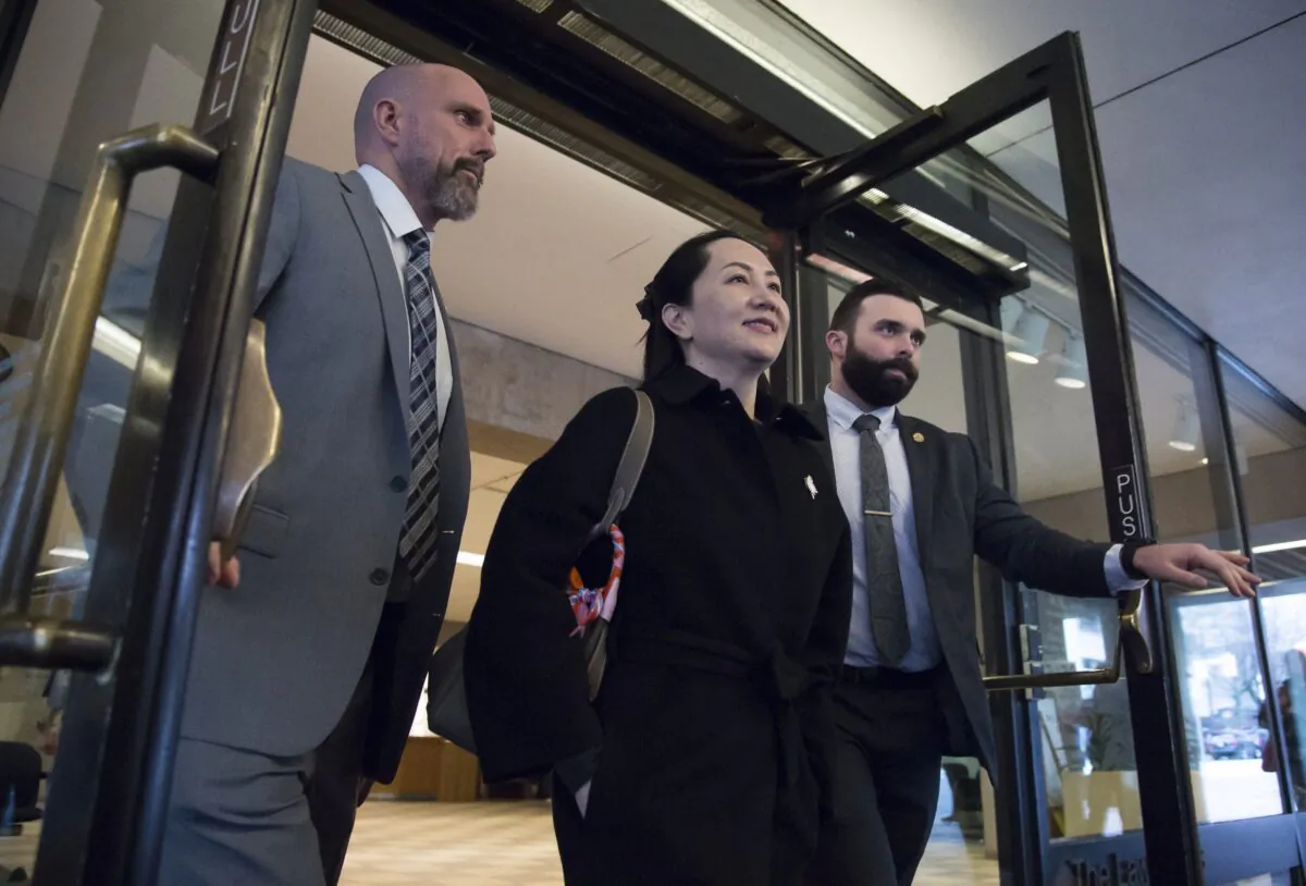 Meng Wanzhou, chief financial officer of Huawei, leaves B.C. Supreme Court in Vancouver, on Jan. 21, 2020. (The Canadian Press/Jonathan Hayward)