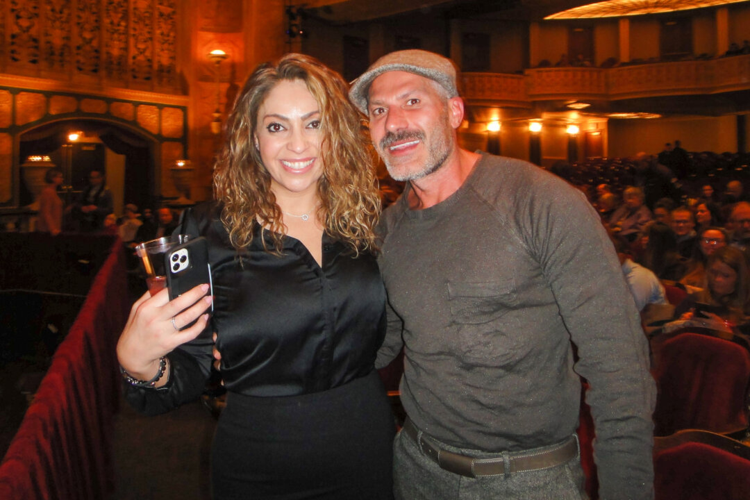 International business attorney Laurie Tannous enjoys Shen Yun Performing Arts with a friend, on Jan. 22, 2020, at the Detroit Opera House. (Dongyu Teng/The Epoch Times)