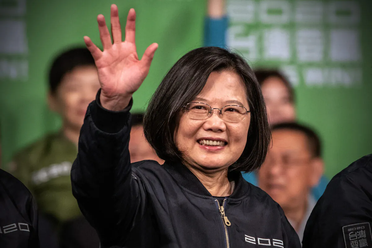 Tsai Ing-Wen waves after addressing supporters following her re-election as President of Taiwan in Taipei, Taiwan, on Jan. 11, 2020. (Carl Court/Getty Images)