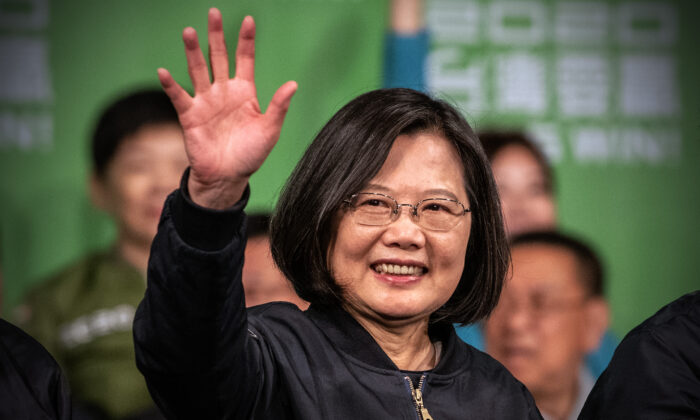 Tsai Ing-Wen waves after addressing supporters following her re-election as President of Taiwan in Taipei, Taiwan, on Jan. 11, 2020. (Carl Court/Getty Images)