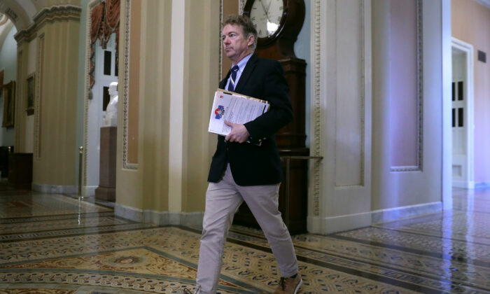 Sen. Rand Paul (R-Ky.) heads toward the Senate Chamber before the start of President Donald Trump's impeachment trial at the U.S. Capitol in Washington on Jan. 21, 2020. (Chip Somodevilla/Getty Images)