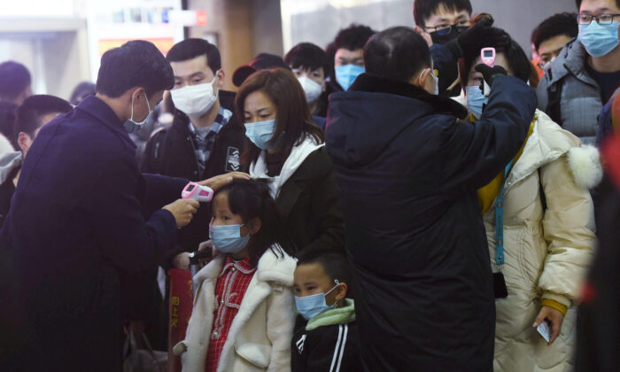 Panic Stirs in Chinese City Where Deadly Virus Broke Out