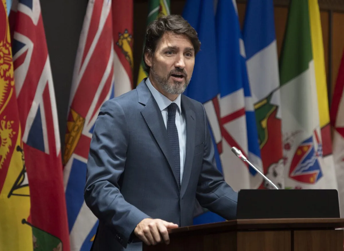 Prime Minister Justin Trudeau speaks to members of caucus on Parliament Hill in Ottawa on Jan. 23, 2020. (The Canadian Press/Adrian Wyld)