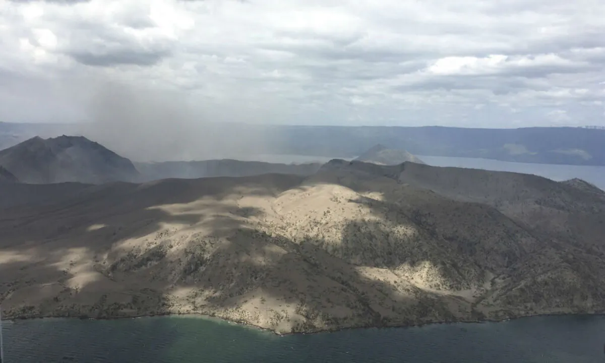Taal volcano emits small amounts of ash in Batangas province, southern Philippines, on Jan. 21, 2020. (Philippines Office of Civil Defense via AP)