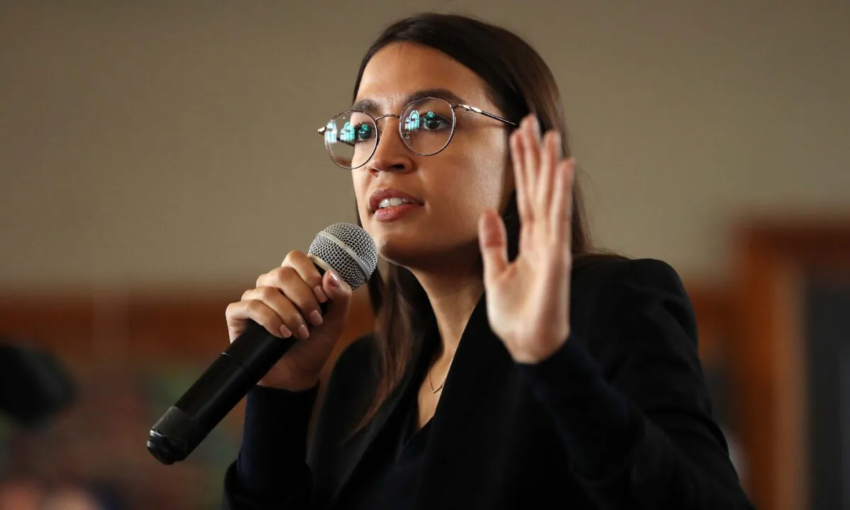 Rep. Alexandria Ocasio-Cortez (D-N.Y.) speaks during a campaign event with Democratic presidential candidate Sen. Bernie Sanders (I-Vt.) at La Poste in Perry, Iowa, on Jan. 26, 2020. (Chip Somodevilla/Getty Images)