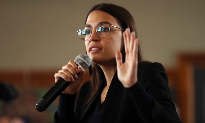 Rep. Alexandria Ocasio-Cortez (D-N.Y.) speaks during a campaign event with Democratic presidential candidate Sen. Bernie Sanders (I-Vt.) at La Poste in Perry, Iowa, on Jan. 26, 2020. (Chip Somodevilla/Getty Images)
