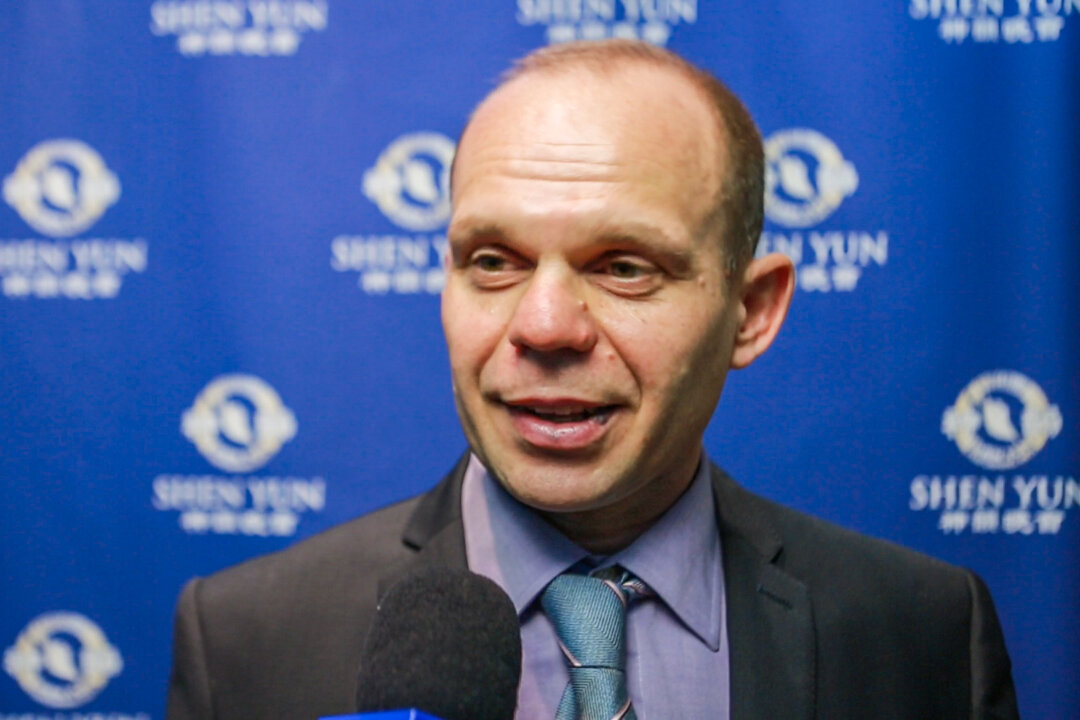Kris Wozniak, a martial arts and gymnastics club owner and coach, attended Shen Yun Performing Arts at London's Eventim Apollo, on Jan. 26, 2020. (NTD Television)