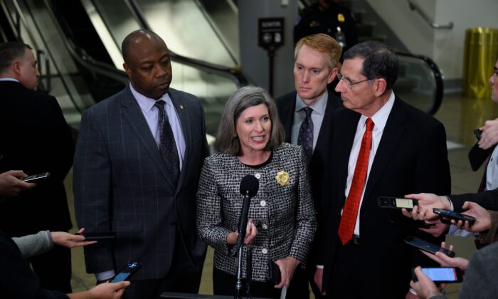 Sen. Joni Ernst (R-Iowa), center, speaks as Sens. Tim Scott (R-S.C.), left, James Lankford (R-Okla.), second from right, and John Barrasso (R-Okla.) listen during a press conference during a break in the Senate impeachment trial of President Donald Trump at the U.S. Capitol in Washington on Jan. 23, 2020. (Andrew Caballero-Reynolds/AFP via Getty Images)