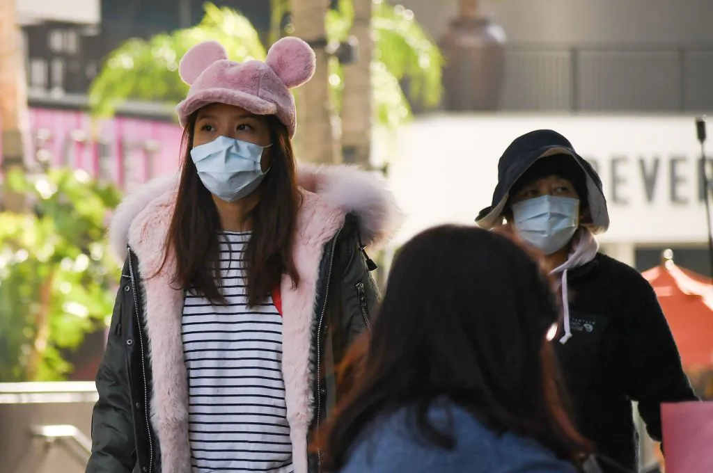 Visitors to the Hollywood & Highland mall in Hollywood wear face masks on Jan. 27, 2020. (Robyn Beck/AFP via Getty Images)