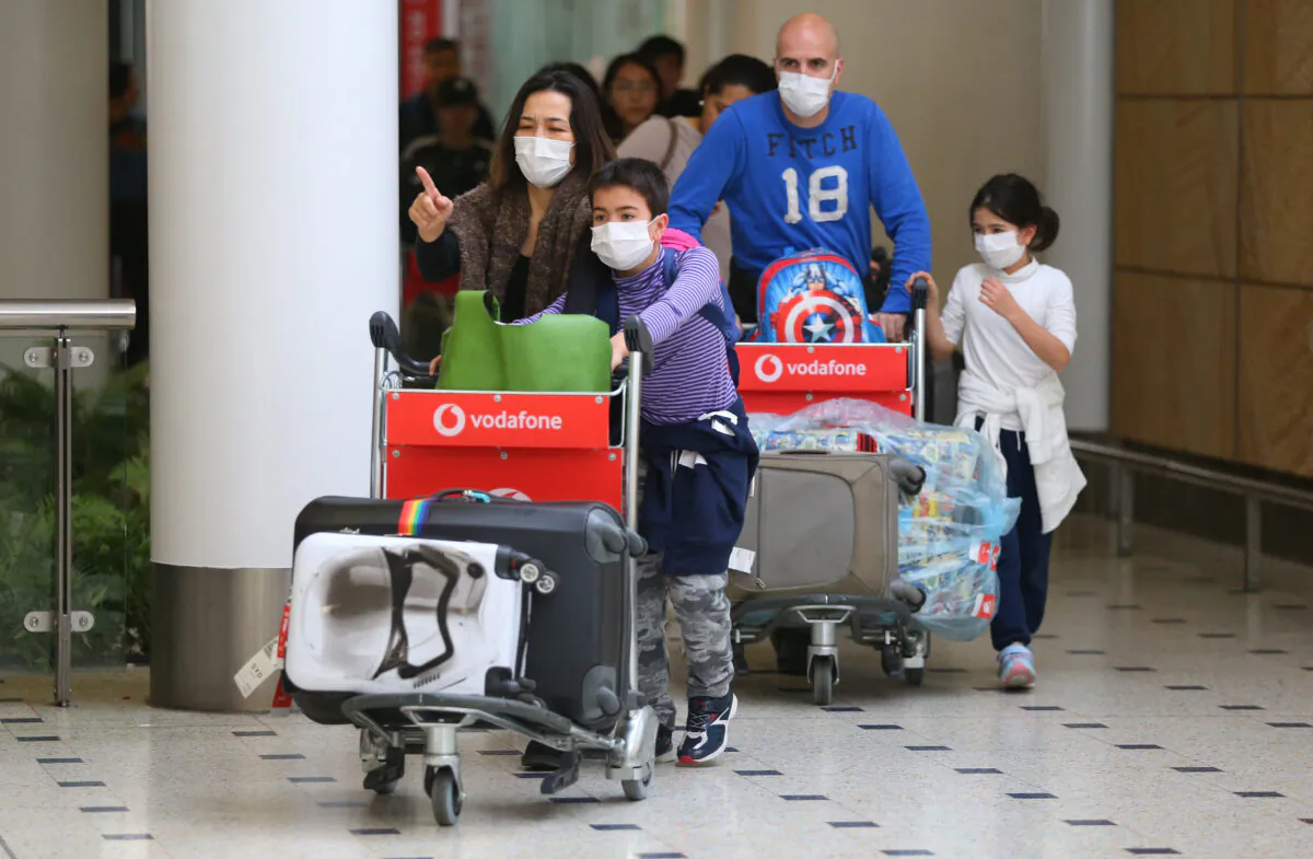 Passengers arrive at Sydney International Airport in Sydney, Australia, on Jan. 23, 2020. (Don Arnold/Getty Images)