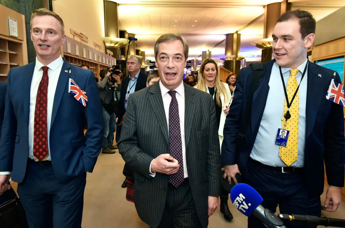 Britain's Brexit Party leader Nigel Farage (C) speaks to the press after the European Parliament ratified the Brexit deal in Brussels on Jan. 29, 2020. (JOHN THYS/AFP via Getty Images)