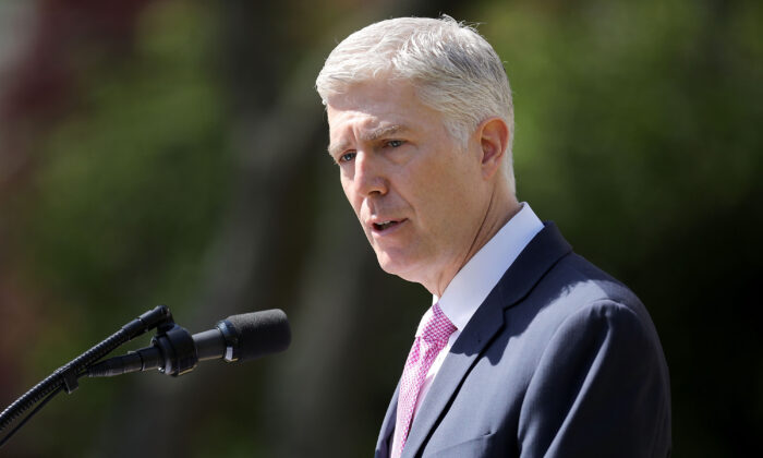 Supreme Court Associate Justice Neil Gorsuch delivers remarks after taking the judicial oath during a ceremony in the Rose Garden at the White House in Washington April 10, 2017. (Chip Somodevilla/Getty Images)