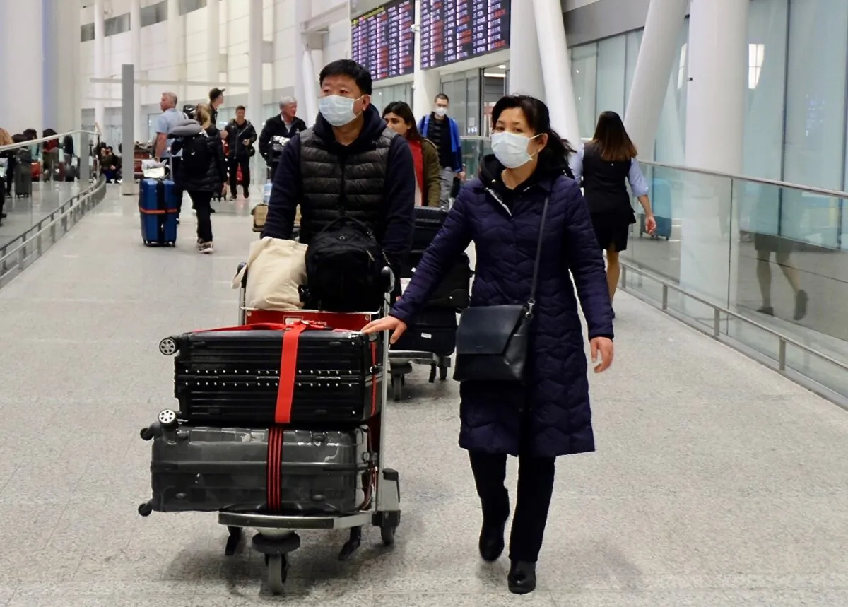 Passengers arrive at Toronto Pearson Airport on a flight from Beijing on Jan. 25, 2020. (Becky Zhou/The Epoch Times)
