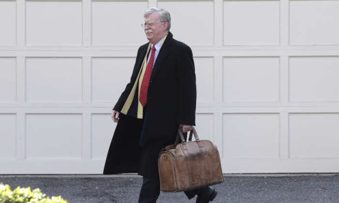 Former national security adviser John Bolton leaves his home in Bethesda, Md., on Jan. 28, 2020. (Luis M. Alvarez/AP Photo)