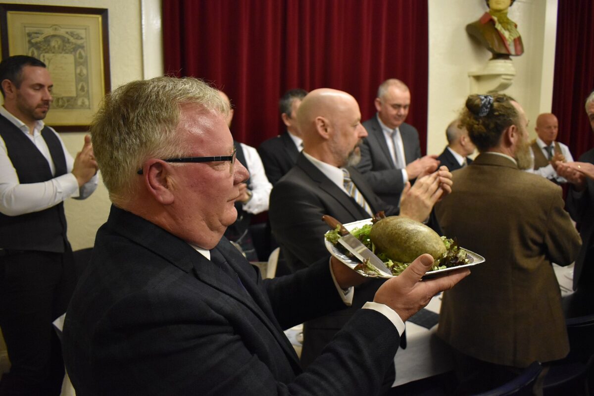 A haggis being brought in at Burns Club's in Dundee, Scotland, for the 160th annual Burns supper on 25 Jan. 25, 2020. (CC BY-SA 4.0)