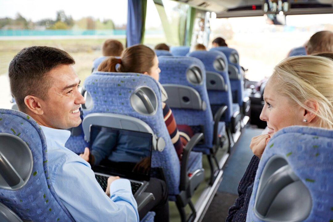 Striking up a conversation with a stranger can boost your well-being—and their's too. (Syda Productions/Shutterstock)